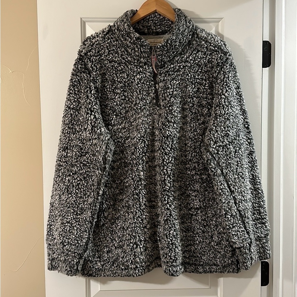 Weatherproof fluffy half zip pullover.